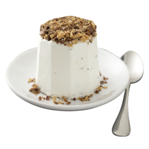 Semifreddo al torroncino. Nougat semifreddo ice cream topped with crushed praline hazelnuts.